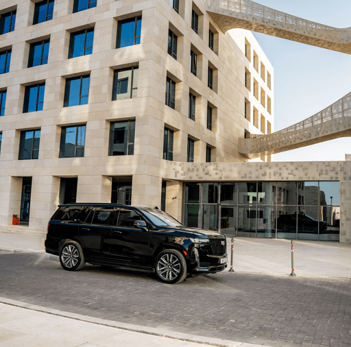 Luxury vehicle in contemporary architecture setting
