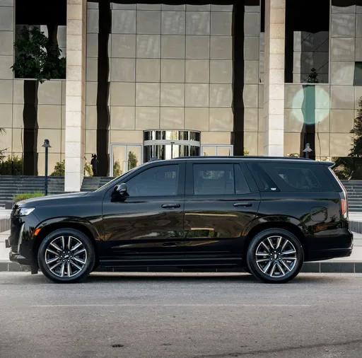 Luxury vehicle in contemporary architecture setting